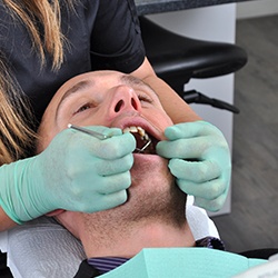 Man receiving dental treatment